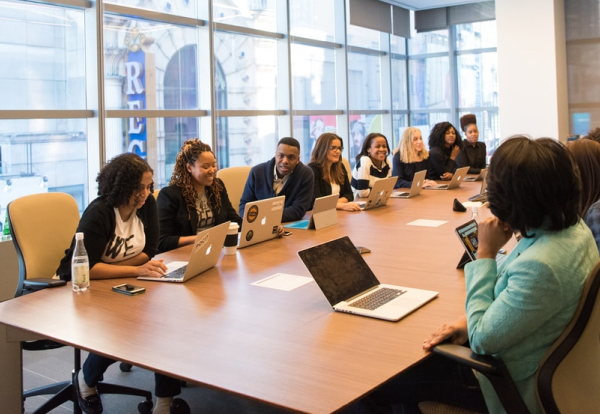 People sitting around conference table